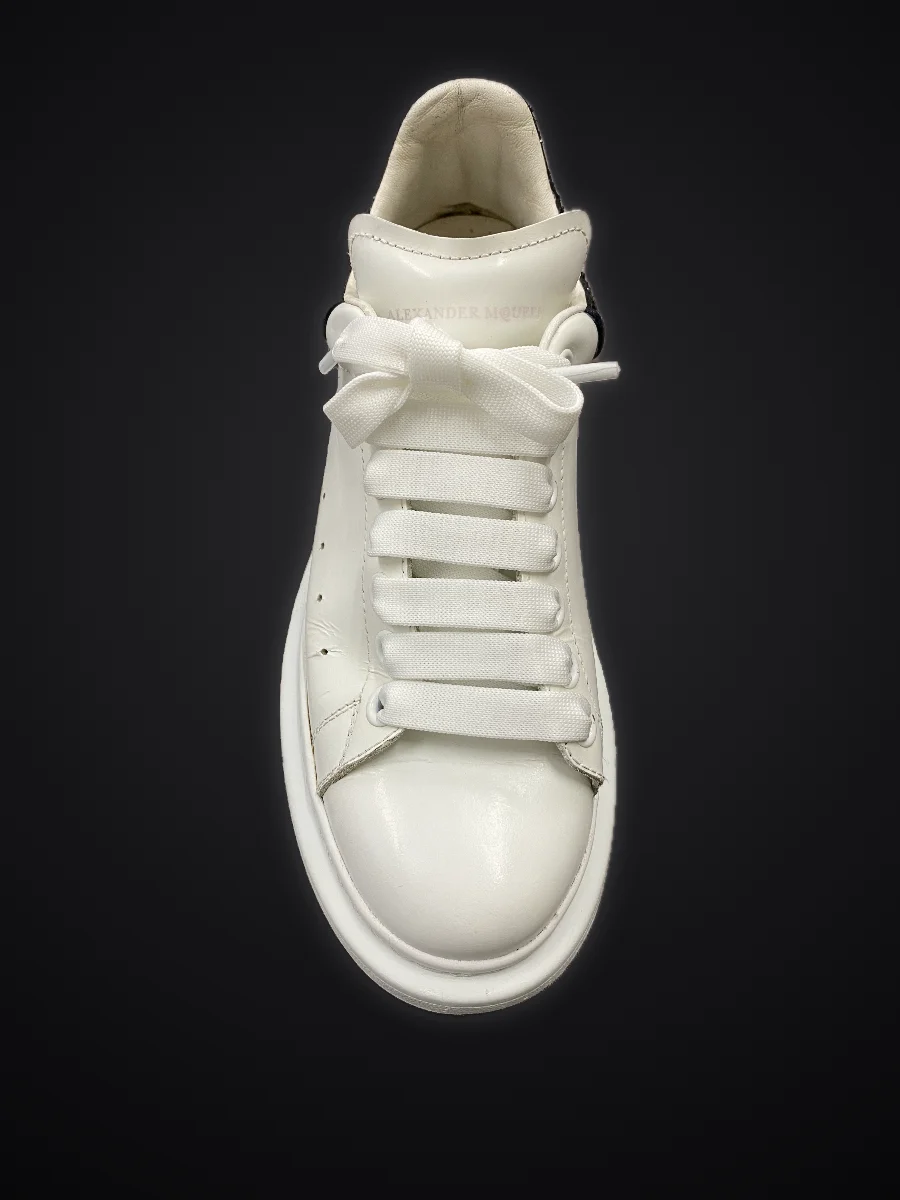 The same sneaker after cleaning: bright white again