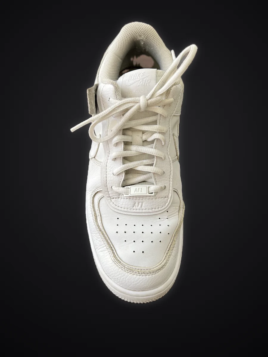 The same sneaker after cleaning: bright white again